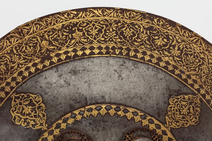 A fine chiselled gold overlaid Indian shield | MasterArt